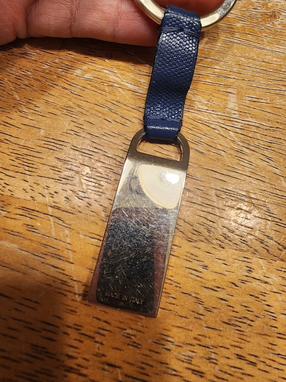 blue leather Fendi logo plaque keychain features silver-tone hardware